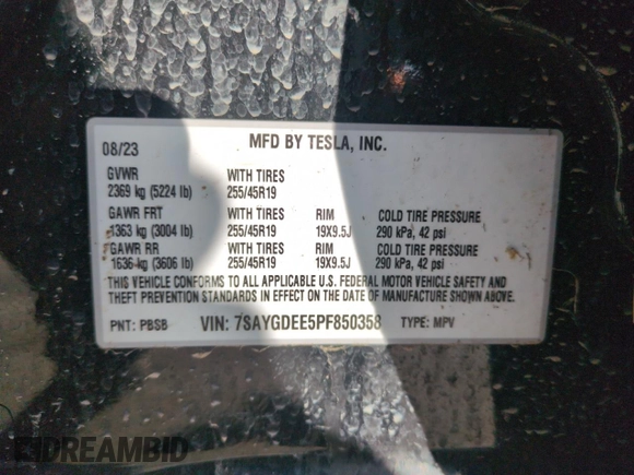 2023 Tesla Model Y Long Range with VIN 7SAYGDEE5PF850358, listed as a Copart auction lot 52581615 with 19,376 mi miles and Salvage Title. Bid and sale history available at DreamBid. Image 14.