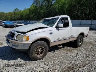 1998 Ford F-150 with VIN 1FTZF18WXWNC01338, listed as a Copart auction lot 52317705 with 67,305 mi miles and Salvage title. Bid and sale history available at DreamBid. Image 1.