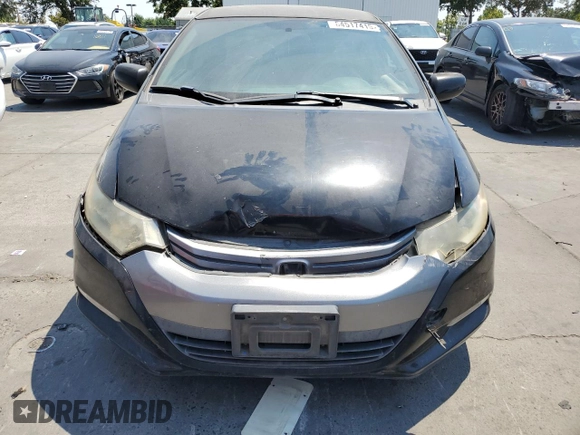 2010 Honda Insight LX with VIN JHMZE2H59AS041185, listed as a Copart auction lot 64517415 with 208,242 mi miles and Salvage title. Bid and sale history available at DreamBid. Image 5.