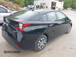 2020 Toyota Prius LE with VIN JTDL9RFU8L3014930, listed as a IAAI auction lot 42171038 with 67,785 mi miles and . Bid and sale history available at DreamBid. Image 4.