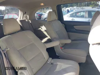 2013 Honda Odyssey LX z VIN 5FNRL5H29DB055166, wystawiony jako IAAI lot #41965037 z przebiegiem 122 470 mil mil oraz . Historia ofert i sprzedaży dostępna na DreamBid. Obrazek 8.