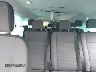 2025 Ford Transit Passenger XL with VIN 1FBAX2Y89SKA20118, listed as a IAAI auction lot 42426401 with 9,451 mi miles and . Bid and sale history available at DreamBid. Image 8.