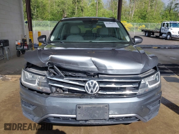 2018 Volkswagen Tiguan SEL with VIN 3VV3B7AX6JM054849, listed as a IAAI auction lot 42303112 with 87,574 mi miles and . Bid and sale history available at DreamBid. Image 12.