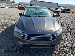 2019 Ford Fusion SE with VIN 3FA6P0HD9KR158973, listed as a Copart auction lot 50158435 with 76,956 mi miles and Salvage Title. Bid and sale history available at DreamBid. Image 5.