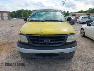 2000 Ford F-150 XL with VIN 1FTRX18W0YKB28000, listed as a IAAI auction lot 42451649 with 193,718 mi miles and . Bid and sale history available at DreamBid. Image 12.