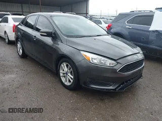 2015 Ford Focus SE with VIN 1FADP3F28FL219552, listed as a IAAI auction lot 41959648 with 128,590 mi miles. Bid and sale history available at carsss.com. Image 1.