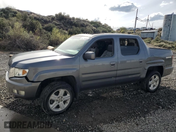 2012 Honda Ridgeline RTL with VIN 5FPYK1F58CB452281, listed as a Copart auction lot 54279455 with 189,314 mi miles and Salvage title. Bid and sale history available at DreamBid. Image 1.