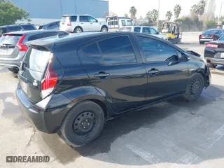 2015 Toyota Prius c One with VIN JTDKDTB3XF1585940, listed as a IAAI auction lot 41263863 with 267,841 mi miles. Bid and sale history available at carsss.com. Image 4.