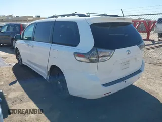 2014 Toyota Sienna SE with VIN 5TDXK3DC0ES477207, listed as a IAAI auction lot 41624619 with 213,881 mi miles and . Bid and sale history available at DreamBid. Image 3.