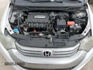 2010 Honda Insight EX with VIN JHMZE2H79AS038112, listed as a Copart auction lot 54794785 with 183,457 mi miles and Salvage Title. Bid and sale history available at DreamBid. Image 11.