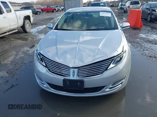2014 Lincoln MKZ z VIN 3LN6L2J95ER830342, wystawiony jako IAAI lot #41876269 z przebiegiem 137 089 mil mil oraz . Historia ofert i sprzedaży dostępna na DreamBid. Obrazek 6.