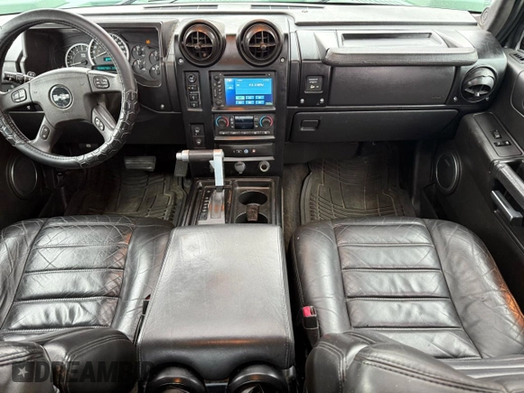 2005 Hummer H2 z VIN 5GRGN22U85107767, wystawiony jako Copart lot #56570325 z przebiegiem 197 076 mil mil oraz Tytuł czysty. Historia ofert i sprzedaży dostępna na DreamBid. Obrazek 9.