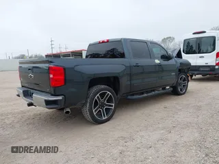 2018 Chevrolet Silverado 1500 LT with VIN 3GCPCREC1JG497019, listed as a IAAI auction lot 41459936 with 52,691 mi miles and . Bid and sale history available at DreamBid. Image 4.