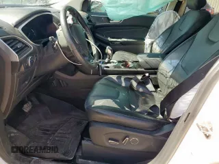 2017 Ford Edge Titanium z VIN 2FMPK4K87HBC26173, wystawiony jako Copart lot #58070565 z przebiegiem 63 989 mil mil oraz Szkoda całkowita • Salvage title. Historia ofert i sprzedaży dostępna na DreamBid. Obrazek 7.