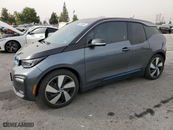 2018 BMW i3 with VIN WBY7Z2C55JVE64933, listed as a Copart auction lot 62085683 with 47,998 mi miles. Bid and sale history available at carsss.com. Image 1.