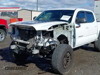 2020 Toyota Tacoma SR5 with VIN 3TMAZ5CN4LM132002, listed as a IAAI auction lot 41224844 with 55,000 mi miles and . Bid and sale history available at DreamBid. Image 6.