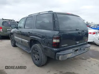 2005 GMC Yukon SLT z VIN 1GKEC13V95J261305, wystawiony jako IAAI lot #42194360 z przebiegiem 193 597 mil mil oraz . Historia ofert i sprzedaży dostępna na DreamBid. Obrazek 3.