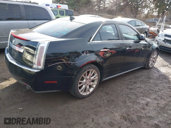 2011 Cadillac CTS with VIN 1G6D25ED1B0161919, listed as a IAAI auction lot 41486191 with 138,567 mi miles and . Bid and sale history available at DreamBid. Image 4.