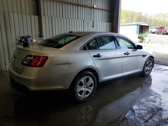 2013 Ford Police Interceptor with VIN 1FAHP2M8XDG127058, listed as a Copart auction lot 55180765 with 126,645 mi miles and Salvage title. Bid and sale history available at DreamBid. Image 3.
