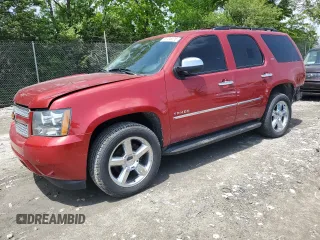 2012 Chevrolet Tahoe LTZ with VIN 1GNSKCE09CR219270, listed as a Copart auction lot 56705075 with 162,695 mi miles and Salvage title. Bid and sale history available at DreamBid. Image 1.