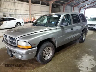 1999 Dodge Durango with VIN 1B4HR28Y2XF708009, listed as a Copart auction lot 79465784 with 143,214 mi miles and Salvage Title. Bid and sale history available at DreamBid. Image 1.