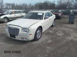 2005 Chrysler 300 with VIN 2C3JA63H65H144648, listed as a IAAI auction lot 41762730 with 125,757 mi miles. Bid and sale history available at carsss.com. Image 2.