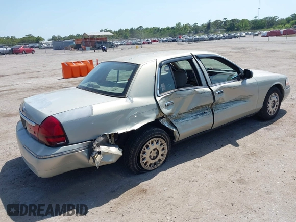 2004 Mercury Grand Marquis GS with VIN 2MEFM74W14X632470, listed as a IAAI auction lot 42120233 with 292,357 mi miles and . Bid and sale history available at DreamBid. Image 4.