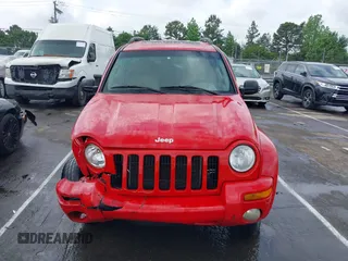 2002 Jeep Liberty Limited z VIN 1J8GL58K42W262492, wystawiony jako IAAI lot #42121270 z przebiegiem 167 662 mil mil oraz . Historia ofert i sprzedaży dostępna na DreamBid. Obrazek 13.