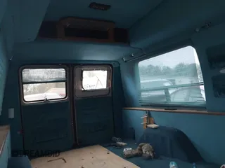 1995 Chevrolet Chevy Van z VIN 1GBEG25K8SF245639, wystawiony jako IAAI lot #41917862 z przebiegiem 89 015 mil mil oraz . Historia ofert i sprzedaży dostępna na DreamBid. Obrazek 8.