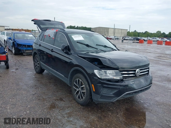 2021 Volkswagen Tiguan SE z VIN 3VV3B7AX7MM004286, wystawiony jako IAAI lot #39864219 z przebiegiem 67 429 mil mil oraz . Historia ofert i sprzedaży dostępna na DreamBid. Obrazek 1.