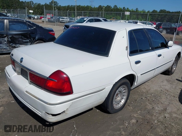 2000 Mercury Grand Marquis LS z VIN 2MEFM75W3YX689323, wystawiony jako IAAI lot #42019687 z przebiegiem 241 045 mil mil oraz . Historia ofert i sprzedaży dostępna na DreamBid. Obrazek 4.