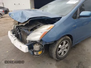 2007 Toyota Prius with VIN JTDKB20U477685445, listed as a IAAI auction lot 42020786 with 243,679 mi miles. Bid and sale history available at carsss.com. Image 6.