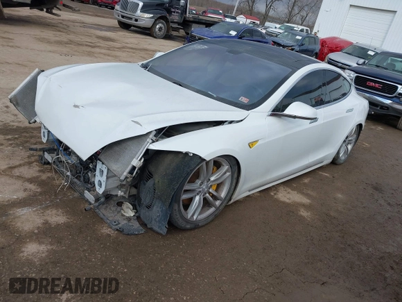 2012 Tesla Model S Performance with VIN 5YJSA1DP4CFP02346, listed as a IAAI auction lot 41642201 with Not Provided miles. Bid and sale history available at carsss.com. Image 2.