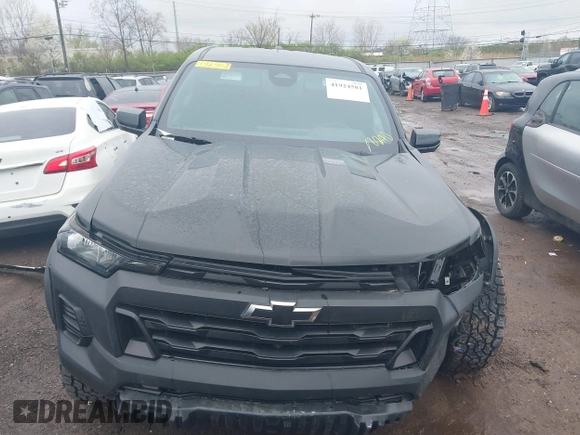 2023 Chevrolet Colorado 4WD Trail Boss with VIN 1GCPTEEK9P1196702, listed as a IAAI auction lot 41924581 with 21,882 mi miles. Bid and sale history available at carsss.com. Image 12.