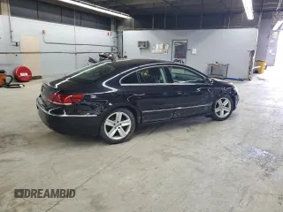2013 Volkswagen CC Sport z VIN WVWAP7AN3DE517918, wystawiony jako Copart lot #55080285 z przebiegiem 56 408 mil mil oraz Szkody całkowita. Historia ofert i sprzedaży dostępna na DreamBid. Obrazek 3.