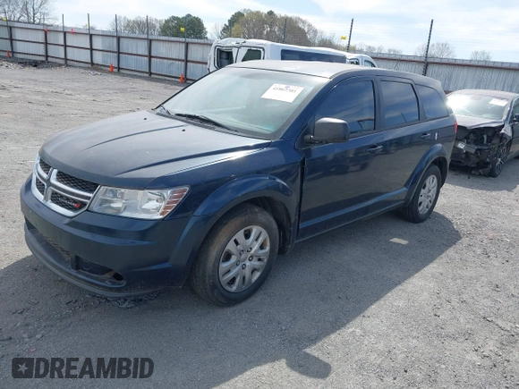 2014 Dodge Journey American Value Pkg with VIN 3C4PDCAB7ET101132, listed as a IAAI auction lot 41802381 with 101,895 mi miles. Bid and sale history available at carsss.com. Image 2.