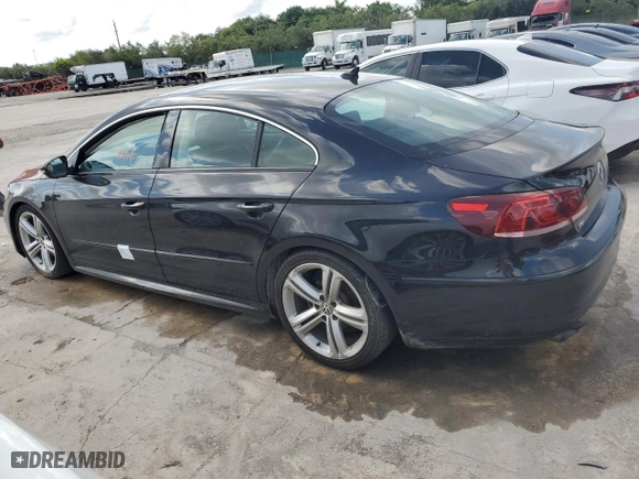 2014 Volkswagen CC R-Line with VIN WVWAN7AN5EE534548, listed as a Copart auction lot 61730364 with 104,545 mi miles and Salvage Title. Bid and sale history available at carsss.com. Image 2.