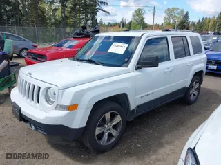 2016 Jeep Patriot High Altitude Edition with VIN 1C4NJRFB0GD673910, listed as a IAAI auction lot 39201864 with 138,952 mi miles. Bid and sale history available at carsss.com. Image 2.