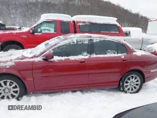 2003 Jaguar X-Type 2.5L Manual z VIN SAJEA51D63XC89273, wystawiony jako IAAI lot #41298544 z przebiegiem 124 400 mil mil oraz . Historia ofert i sprzedaży dostępna na DreamBid. Obrazek 14.