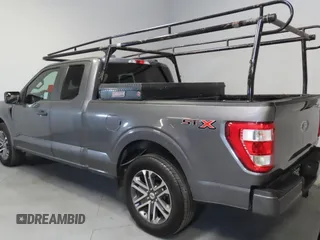2021 Ford F-150 XL with VIN 1FTEX1CP3MKD17894, listed as a Copart auction lot 56984235 with 86,745 mi miles and Salvage title. Bid and sale history available at DreamBid. Image 4.