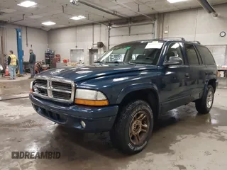 2003 Dodge Durango SLT with VIN 1D4HS48N53F630167, listed as a IAAI auction lot 41844975 with 239,212 mi miles and . Bid and sale history available at DreamBid. Image 2.