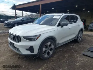 2024 Volvo XC40 Core Bright Theme with VIN YV4L12UK0R2260737, listed as a IAAI auction lot 41433709 with 20,984 mi miles. Bid and sale history available at carsss.com. Image 2.
