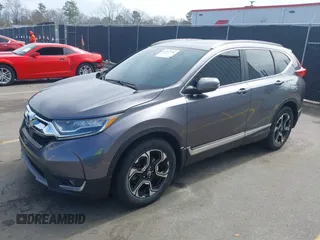 2018 Honda CR-V Touring with VIN 7FARW1H9XJE018575, listed as a IAAI auction lot 41747192 with 83,699 mi miles and . Bid and sale history available at carsss.com. Image 2.