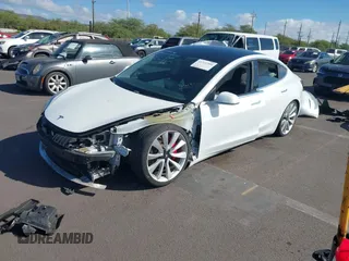 2019 Tesla Model 3 Long Range with VIN 5YJ3E1EBXKF413806, listed as a IAAI auction lot 41321906 with 24,635 mi miles. Bid and sale history available at carsss.com. Image 20.