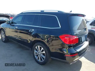 2014 Mercedes-Benz GL 450 with VIN 4JGDF7CE7EA414390, listed as a IAAI auction lot 42554915 with 114,997 mi miles and . Bid and sale history available at DreamBid. Image 3.