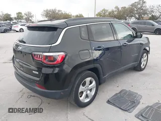 2019 Jeep Compass Altitude z VIN 3C4NJCBB2KT815146, wystawiony jako IAAI lot #41728255 z przebiegiem 50 852 mil mil oraz . Historia ofert i sprzedaży dostępna na DreamBid. Obrazek 4.
