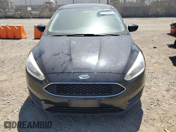 2018 Ford Focus SE z VIN 1FADP3FE0JL293485, wystawiony jako Copart lot #61202625 z przebiegiem 91 025 mil mil oraz Szkoda całkowita • Salvage title. Historia ofert i sprzedaży dostępna na DreamBid. Obrazek 5.