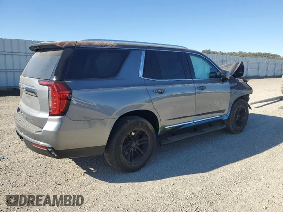 2022 GMC Yukon SLT with VIN 1GKS2BKD0NR115087, listed as a Copart auction lot 64805714 with 43,977 mi miles and Salvage Title. Bid and sale history available at carsss.com. Image 3.