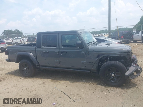 2023 Jeep Gladiator Sport S с VIN 1C6HJTAG7PL522721, выставлен на аукционе IAAI как лот 42594463 с пробегом 64 702 миль миль и . История ставок и продаж доступна на DreamBid. Изображение 13.