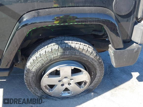2012 Jeep Wrangler Arctic with VIN 1C4AJWBG7CL170079, listed as a IAAI auction lot 41004260 with 83,408 mi miles and . Bid and sale history available at DreamBid. Image 6.